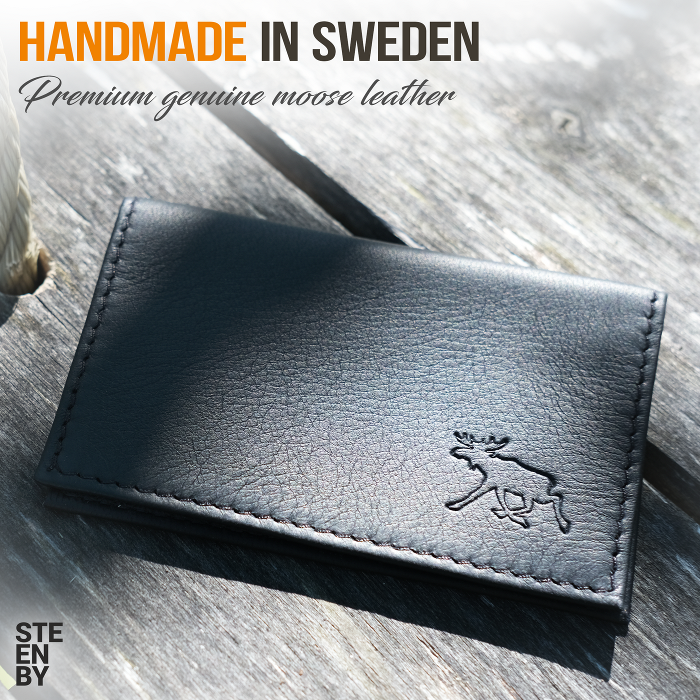 <tc>Card Holder Genuine Moose Leather Black Embossed</tc>